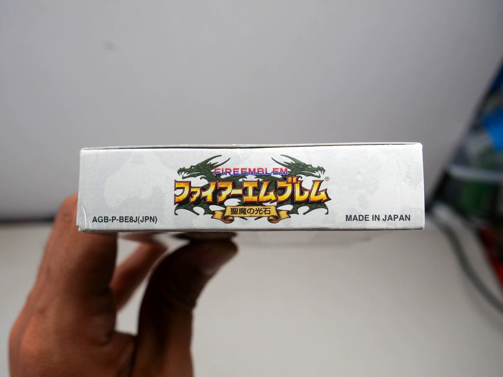 GBA game, flame emblem, holy devil stone, original genuine cartridge, color as shown in the picture, full box, overall good condition, slight indentation on the side of the box, chip memory, normal function, transparent protective box included in