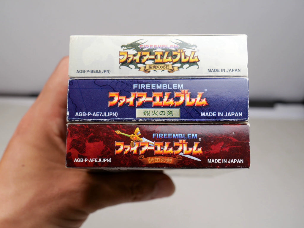 GBA game, three collections of flame emblem series, sword of seal, of fire and stone of holy devil light, original genuine, color as shown in the picture, box said full, cassette function normal, packing price, free shipping transparent protective box.