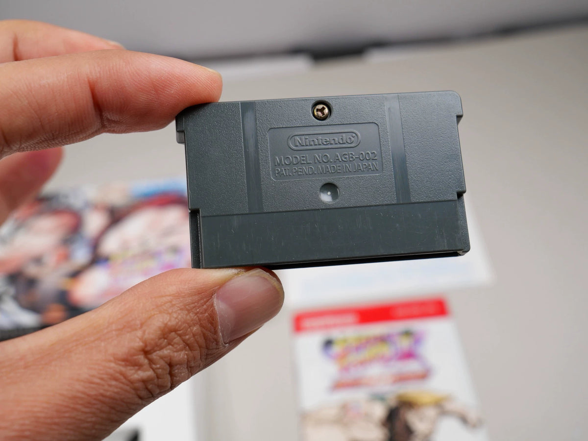 GBA game, Street Fighter, 2X, Resuscitation, Medieval Original Cassette, as shown in the picture, the box is full, the trace of normal use of the box, Figure 9 The inner box is a sticky adhesive, the chip memory, the function is and the transparent