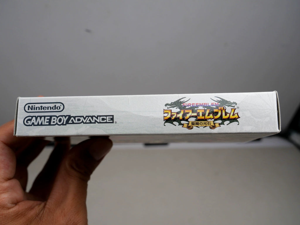 GBA game, flame emblem, holy devil stone, original genuine cartridge, color as shown in the picture, full box, overall good condition, slight indentation on the side of the box, chip memory, normal function, transparent protective box included in