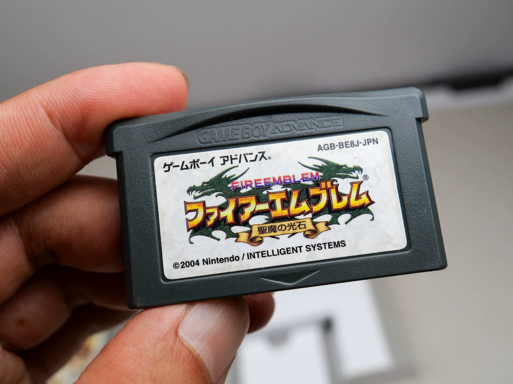 GBA game, flame emblem, holy devil stone, original genuine cartridge, color as shown in the picture, full box, overall good condition, slight indentation on the side of the box, chip memory, normal function, transparent protective box included in