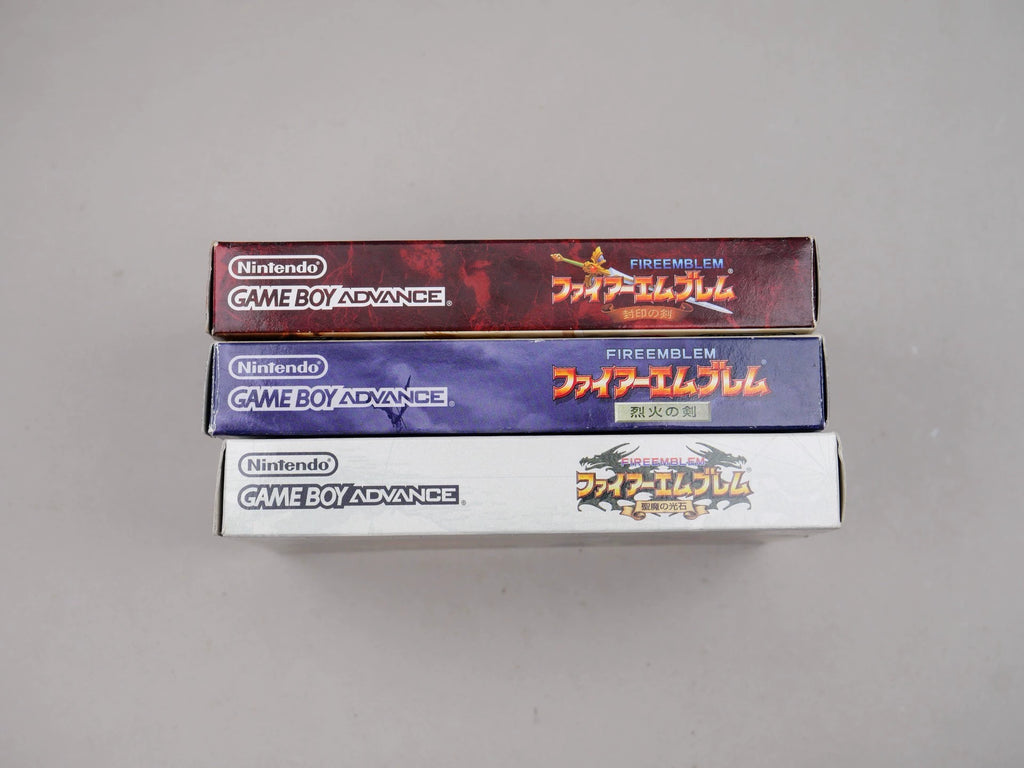 GBA game, three collections of flame emblem series, sword of seal, of fire and stone of holy devil light, original genuine, color as shown in the picture, box said full, cassette function normal, packing price, free shipping transparent protective box.